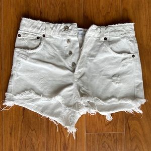 Distressed white denim shorts from Zara